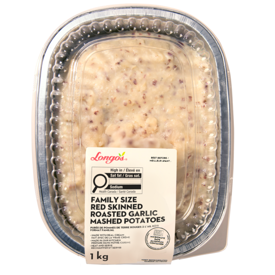 Family-size roasted garlic mashed potatoes made with red-skinned potatoes in a ready-to-heat container.